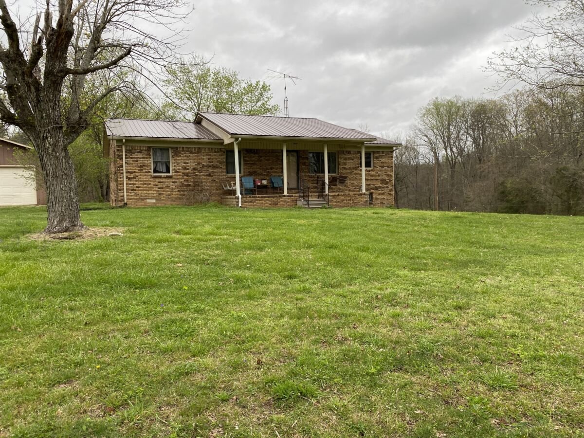 Brick Home & 62 +- Acres • In Tracts • Personal Property