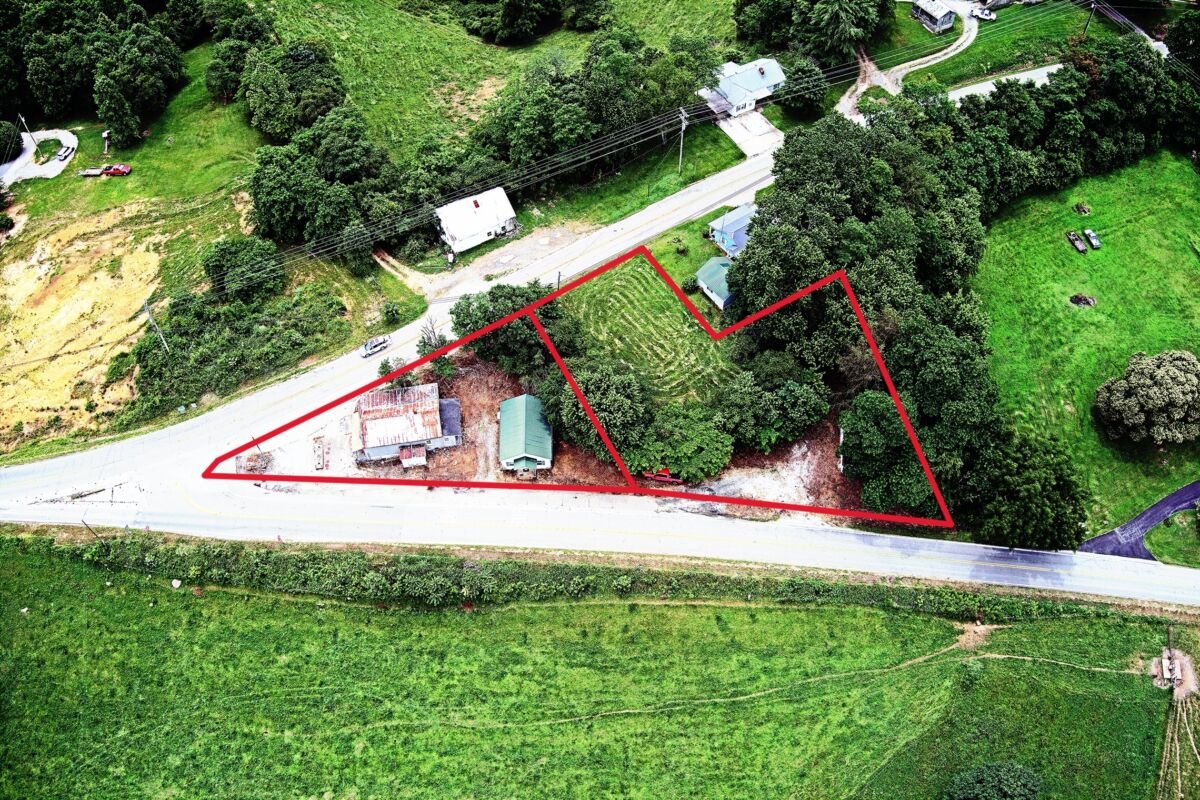 Formerly Cherry’s Market • 2 Homes & 0.59+- Acres • 2 Tracts