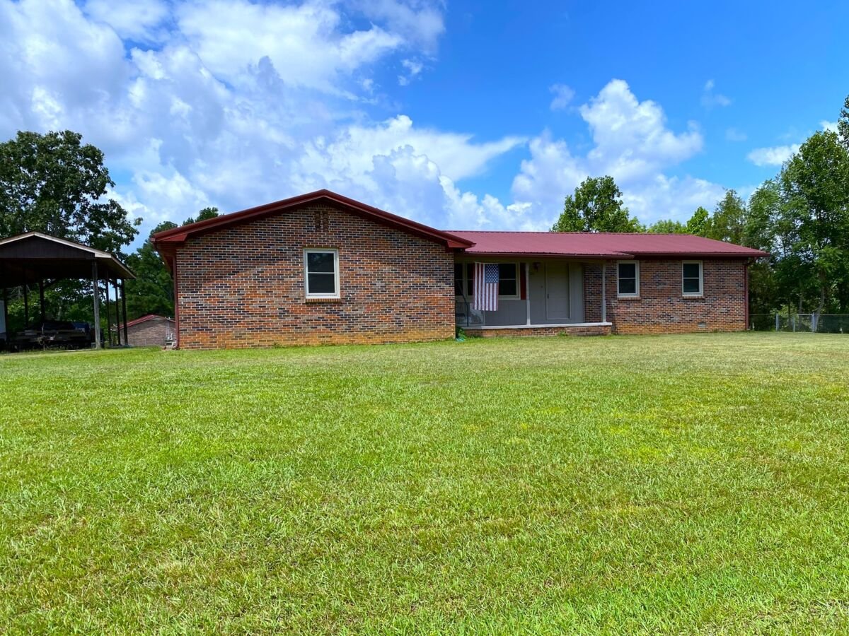 Brick Home & 2.6+/- Acres • Garage • Carport • Outbuilding • Building Lot • 2 Tracts
